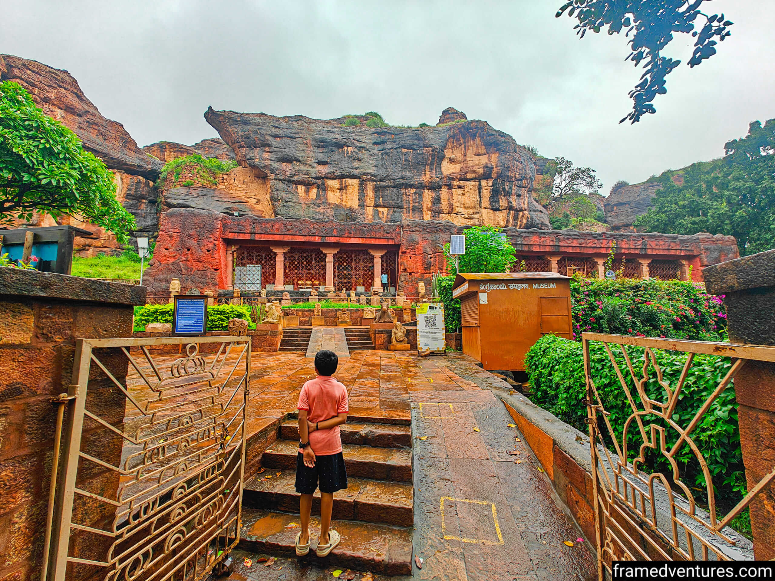 A kid looking at the Archaeological Museum in Badami